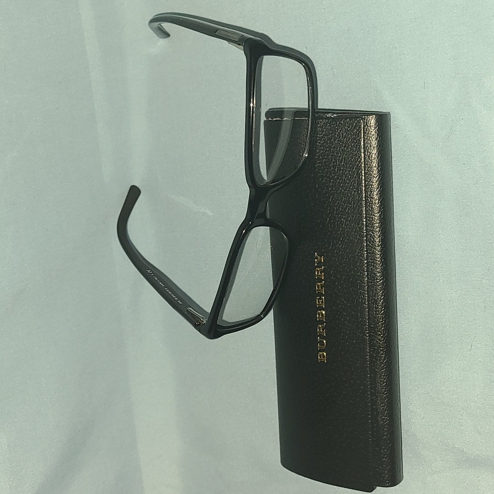 Mens Burberry Eyeglasses. Black with Plaid Burberry Design on both sides.